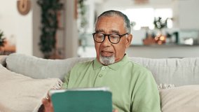 Senior, man and scroll with tablet on sofa for web surfing, playing online games and reading ebook. Retirement, elderly person and happy with digital app in home with streaming subscription and relax - Powered by Shutterstock - Get 15% off with code: PIKWIZARD15