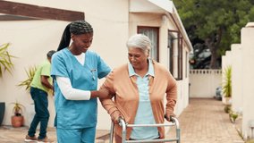 Outdoor, nurse and old woman with walker at retirement home for mobility support, rehabilitation and exercise. Recovery, caregiver and senior person with walking guidance for balance and helping hand - Powered by Shutterstock - Get 15% off with code: PIKWIZARD15