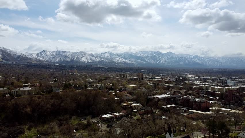 Downtown neighborhood of Salt Lake City with mountain background.