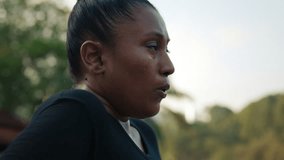 Side View of a Tired Runner Standing and Breathing Heavily After a Marathon. Exhausted Female Jogger Resting After the Run and Recovering Her Breath. People and Sport Concept - Powered by Shutterstock - Get 15% off with code: PIKWIZARD15
