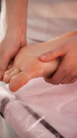 Professional foot massage therapy session
