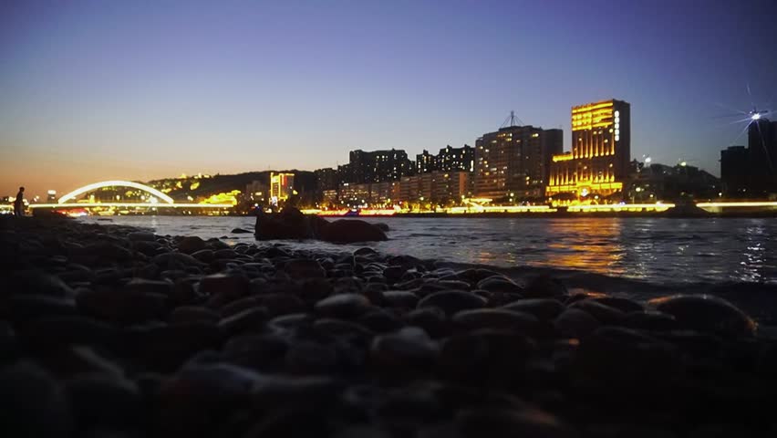 Majestic sunset view over the Yellow River illuminating the city skyline