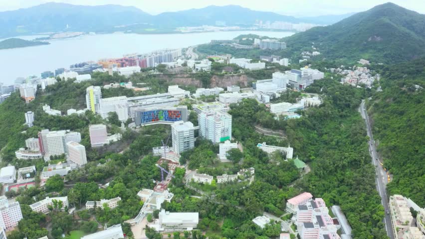 Aerial View of Hong Kong Residential Buildings and Lush Greenery