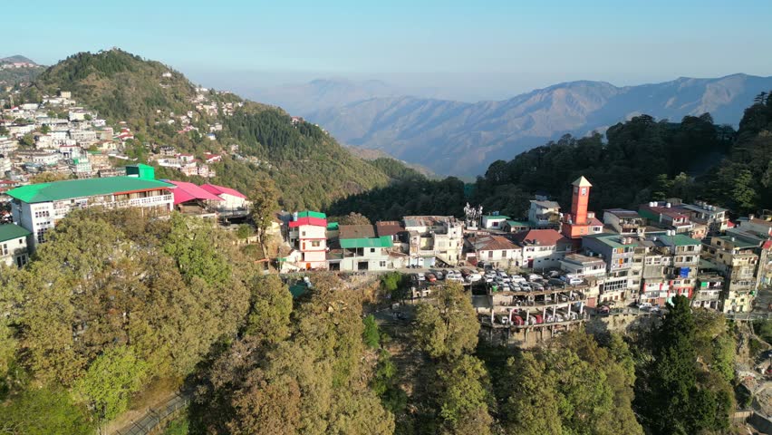 colorful buldings on hills in mussoorie drone view in india
