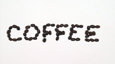 COFFEE in many languages -Stop frame animation using coffee beans of the word "Coffee" in English, German, French, Spanish, Portuguese, Italian, Russian and Turkish. Seamless loop.
