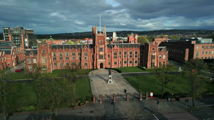 Side-on, forward travelling aerial video of Queen