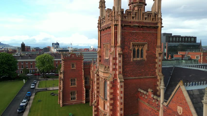 Side-on, reversing aerial video of the Lanyon building at Queen
