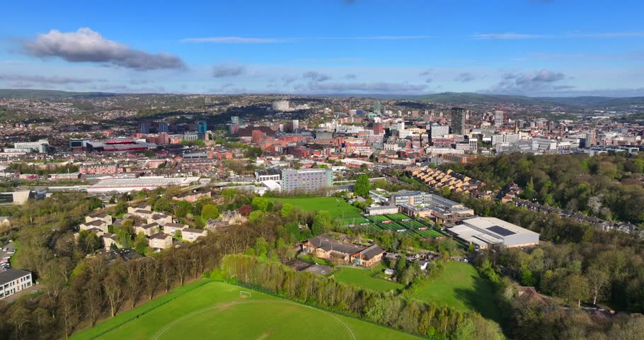 Sheffield, South Yorkshire, United Kingdom. April 17, 2025. Aerial video of Sheffield Skyline from the high perspective of Norfolk Heritage Park. 