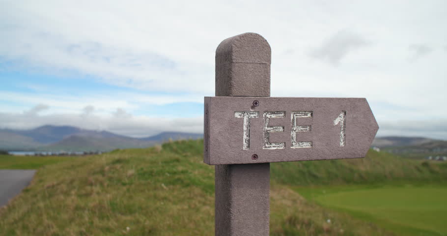 Sign pointing to Tee One on golf course