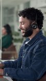 Headset, man and customer service agent in office for communication, contact us or help desk. Technology, call center and male consultant talking with online discussion for crm support in workplace. - Powered by Shutterstock - Get 15% off with code: PIKWIZARD15