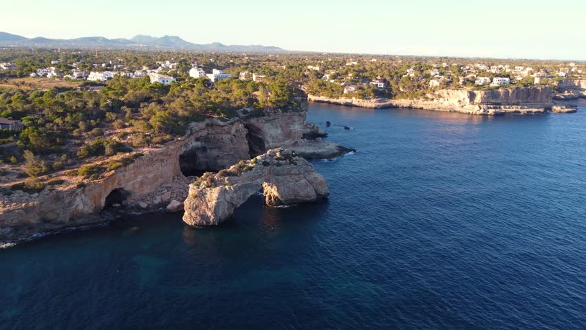 Aerial view of Es Pontas, a natural arch made from limestone in the southeastern part of the island of Mallorca in Spain