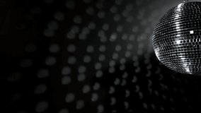 Mirrored disco ball hanging right in dark club, casting square glints and drifting dust 3D render. Luxury, nightlife, vibrant, atmospheric, abstract, shimmer, retro - Powered by Shutterstock - Get 15% off with code: PIKWIZARD15