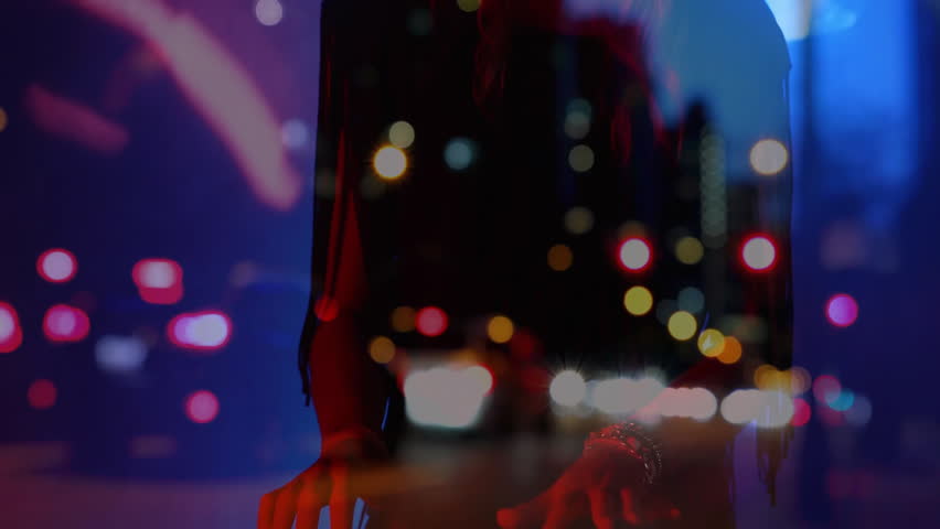 Woman wearing hat posing on night street, featuring moving bokeh orbs and headlights for marketing. Urban, nightscape, stylish, vibrant, glamorous, atmospheric, cinematic