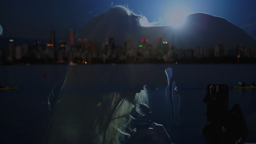 female singer performing in music studio, featuring waterfront skyline overlay with microphone. Musician, urban, aesthetic, nightlife, performance, reflection, silhouette