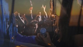 Interviewer holding microphone toward singer with dreamcatcher in music set using live band overlay. Performance, collaboration, energy, vibe, entertainment, creativity, stage - Powered by Shutterstock - Get 15% off with code: PIKWIZARD15