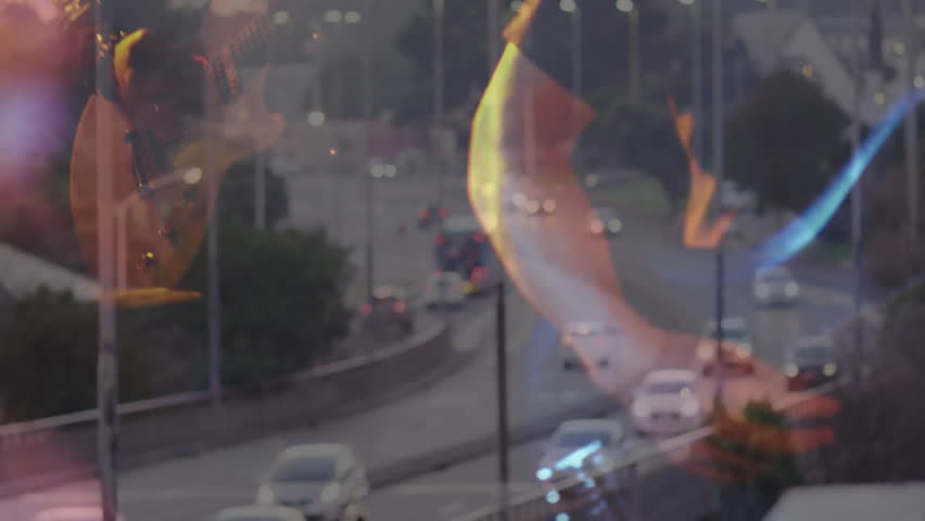 hand holding drinking glass in bar scene, with animated urban traffic icons and light overlays. Abstract, nocturnal, cinematic, vibrant, nightlife, urbanism, atmosphere