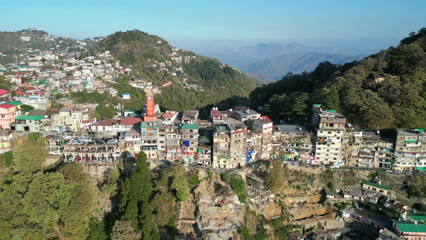 colorful buldings on hills in mussoorie drone view in india