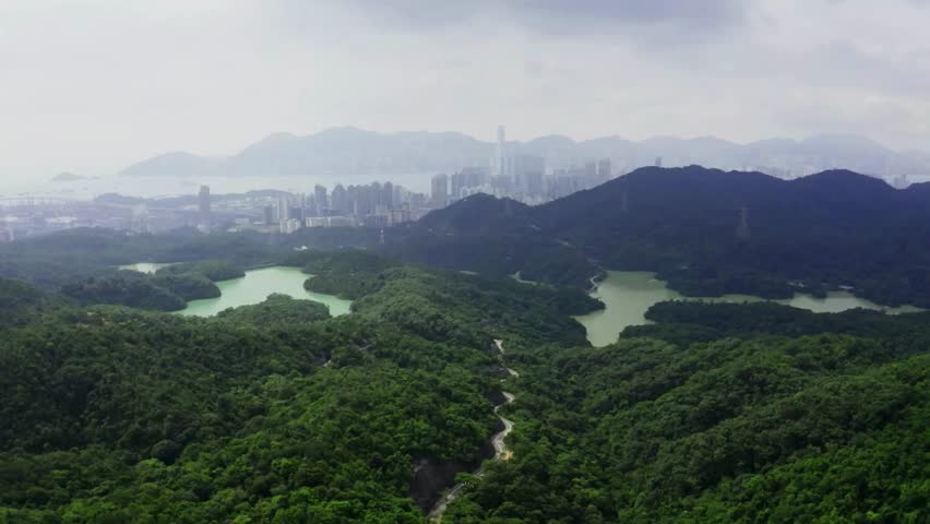 Aerial View of Hong Kong Landscape, City Skyline and Lush Green Hills