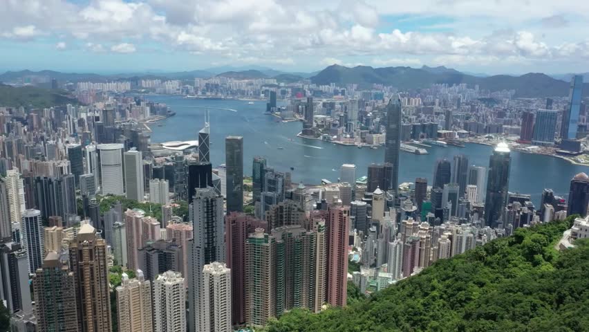 Panoramic View of Hong Kong Skyline and Harbor from Elevated Perspective