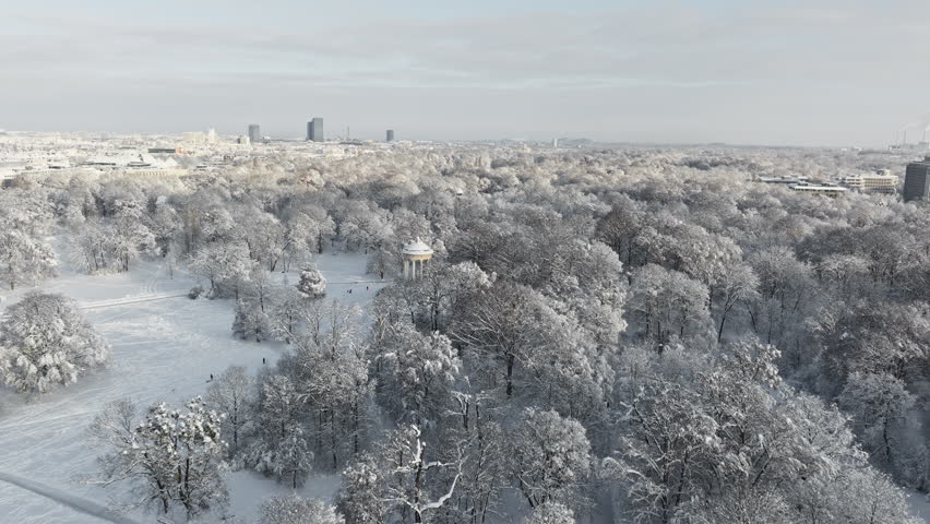 Aerial view of the Englischer Garten in Munich with lots of snow.