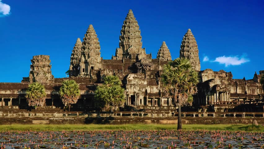 Ancient stone faces of Bayon temple, Angkor, Cambodia Main tower of Angkor Wat temple in Siem Reap in Cambodia. Angkor Wat is the largest religious monument in the world.