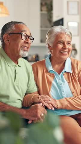 Senior, happy couple and listening with consultation for retirement, pension funding or agreement at home. Elderly, man and woman with smile on sofa for healthcare support or plan together at house