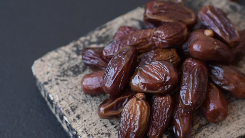 Dried tropical date fruit as an ingredient for fresh organic diet food. Vegan, vegetarian food