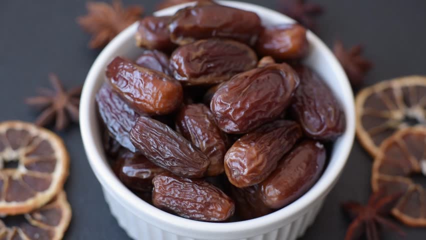 Dried tropical date fruit as an ingredient for fresh organic diet food. Vegan, vegetarian food