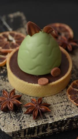 Easter sweet cake or tart in the shape of an egg. Sweets for the table of the religious feast of Easter