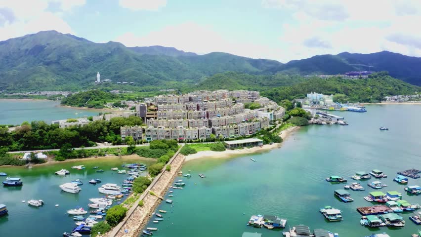Aerial View of Coastal Community and Marina in Hong Kong