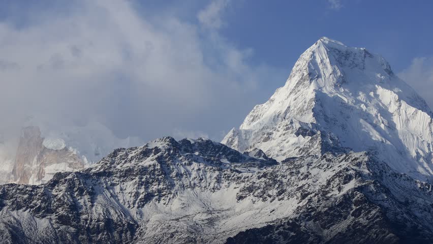 Annapurna South mountain summit in Himalaya mountain range in Nepal. Nepal Himalayas mountains beautiful landscape from Annapurna Base Camp trek. Hiking in the mountains scenic views of Annapurna