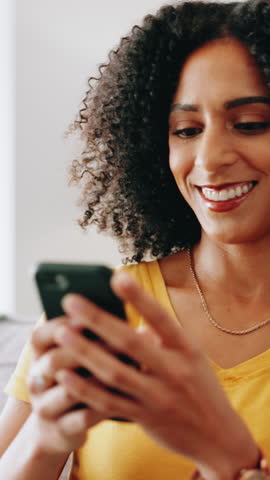 Smile, woman and typing with phone at house for communication, social media and good news. Person, walking and relax with mobile app for browsing, online information and notification with chat update