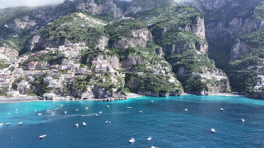 Amalfi Coast At Positano In Salerno Italy. Beach Landscape. Tourism Landmark. Amalfi Coast At Positano In Salerno Italy. Gulf Of Salerno Skyline. Coastal Cityscape. Mediterranean Sea.