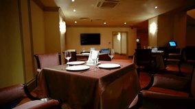 Elegantly made empty dinner tables in a chic restaurant shot with a slider - Powered by Shutterstock - Get 15% off with code: PIKWIZARD15