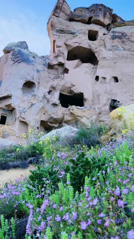 Cavushin Cave City, Cappadocia, Nevsehir, Turkey. An ancient settlement, rocky caves. The oldest rock-cut church in the region. Goreme. Rooms carved by hand in the rocks. 4K
