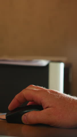 Office worker uses mouse working on computer at desk closeup. Employee inputs data with peripheral device at workplace slow motion. Manager with PC