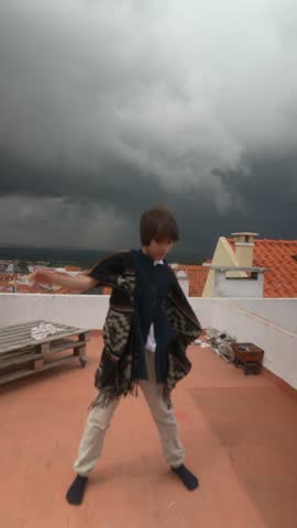 An Engaging and Dynamic Pose Elegantly Captured Against a Dramatic Stormy Sky Backdrop