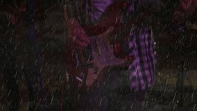 Music collaborators singing into studio microphones in recording room showing animated rain overlay. Vocalists, collaboration, recording, studio, sound, music, performance - Powered by Shutterstock - Get 15% off with code: PIKWIZARD15