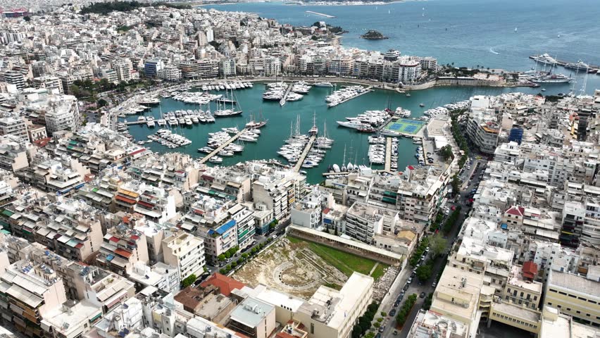 Aerial drone photo of beautiful round harbour and Marina of  Zea or Passalimani in the heart of Piraeus as seen from high altitude, Attica, Greece