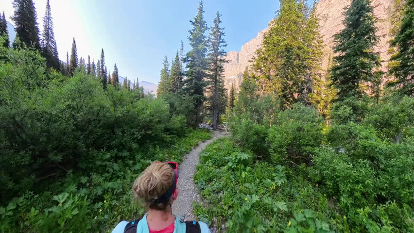 Overhead of Woman on Beautiful Trail in Glacier National Park