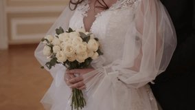 Very beautiful wedding bridal bouquet, made of white roch and austoma, and yellow daisies, green casting of eucalyptus.  Wedding, engagement. Bride and groom. Bride's wedding bouquet. - Powered by Shutterstock - Get 15% off with code: PIKWIZARD15