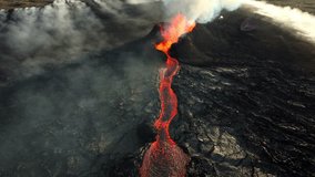 Volcano Eruption, Flowing Red Hot Lava Erupts from Crater, Incredible Natural Phenomena, Spectacular Dramatic Scenery in Iceland - Powered by Shutterstock - Get 15% off with code: PIKWIZARD15