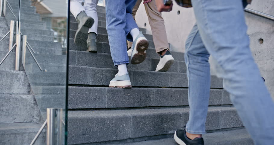 University, college and feet of people on stairs walking for commute to class, lesson and lecture. Academy, school and closeup of students on steps on campus for learning, education and scholarship
