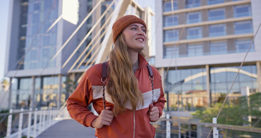 College, girl and thinking with backpack at campus for higher education, future and development. Outdoor, freshman and student with smile by building for learning, knowledge and first day at academy