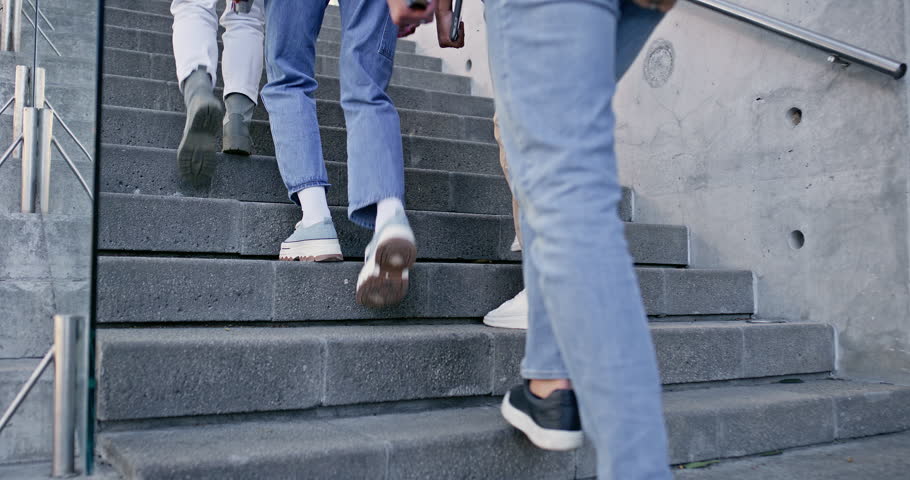 University, school and feet of people on stairs walking for commute to class, lesson and lecture. Academy, college and closeup of students on steps on campus for learning, education and scholarship