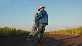 Father farmer little daughter play on field. Child girl runs to dad, father spins girl on field in sun rays. Father little girl, teamwork on field. Family vacation. Dad child teamwork. Family weekend - Powered by Shutterstock - Get 15% off with code: PIKWIZARD15