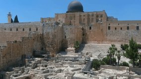 Southern Wall of Temple Mount and dome of the rock, Aerial

Ancient view of the Southern Wall and Al-Aqsa Mosque in the Old City of Jerusalem, featuring historic ruins,  - Powered by Shutterstock - Get 15% off with code: PIKWIZARD15
