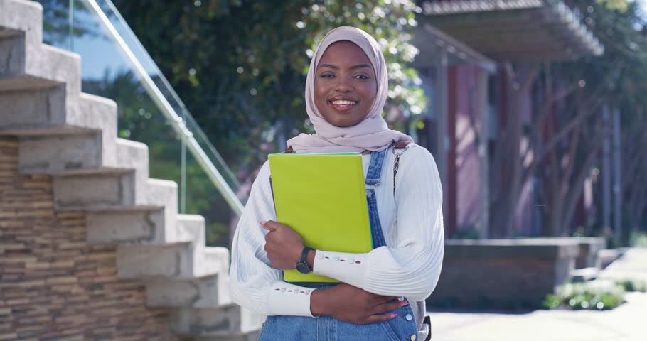 Face, black woman or Muslim student at college campus outdoor with books for learning opportunity. Portrait, smile or Islamic person at university for studying or education scholarship in South Sudan