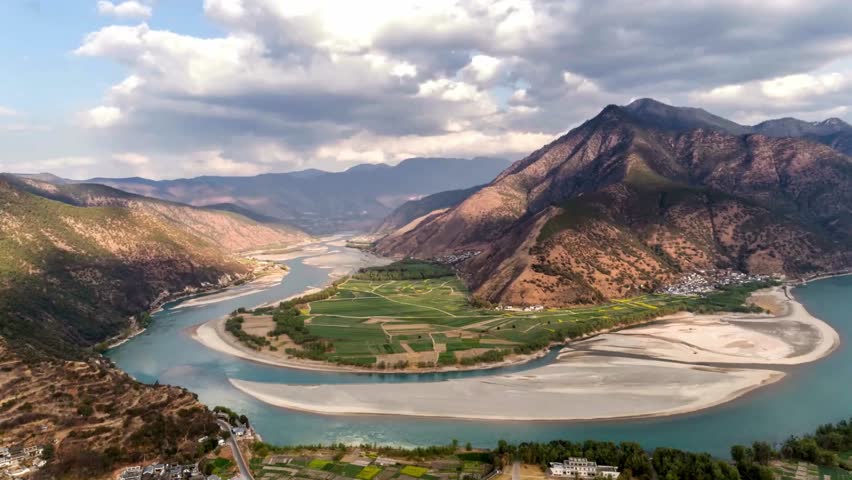 Panoramic View of River Bend in Mountainous Landscape