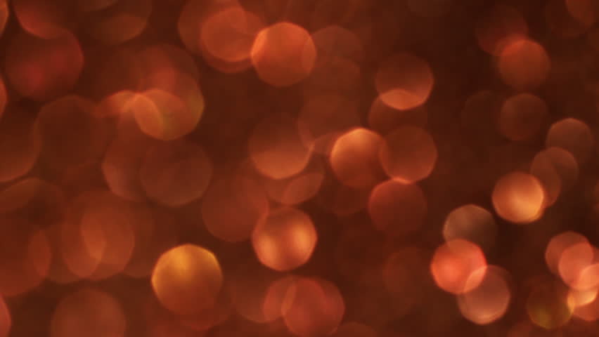 Blurred ray. Orange confetti. Shimmering round spots with smooth transition of glittering dots shades. Warm tranquil whimsical iridescent glow. - Powered by Shutterstock - Get 15% off with code: PIKWIZARD15